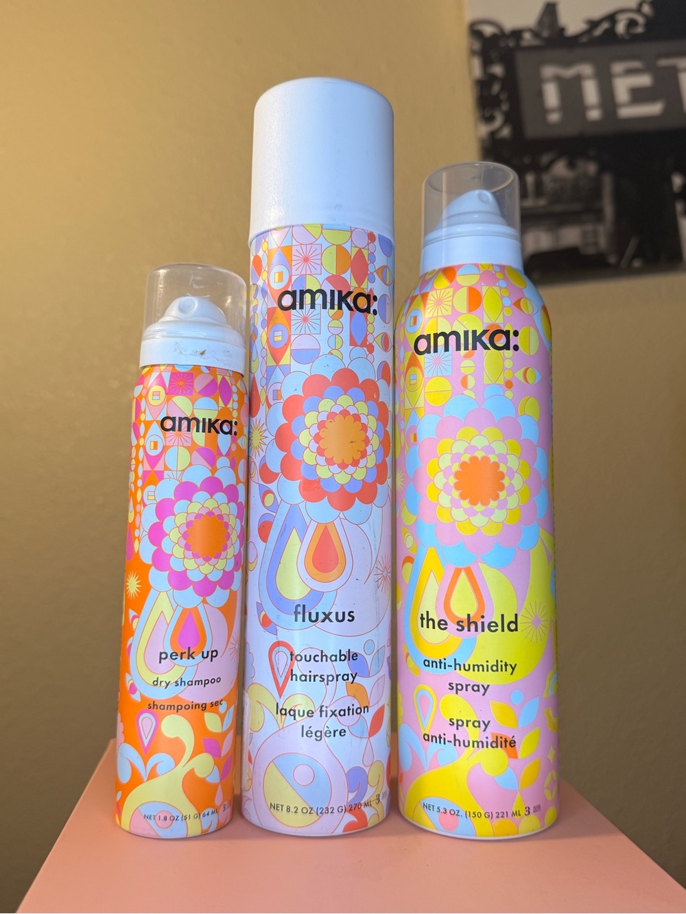 amika dry shampoo 1.8oz, Fluxus hairspray 8.2 oz, and Anti-humidity spray 5.3oz